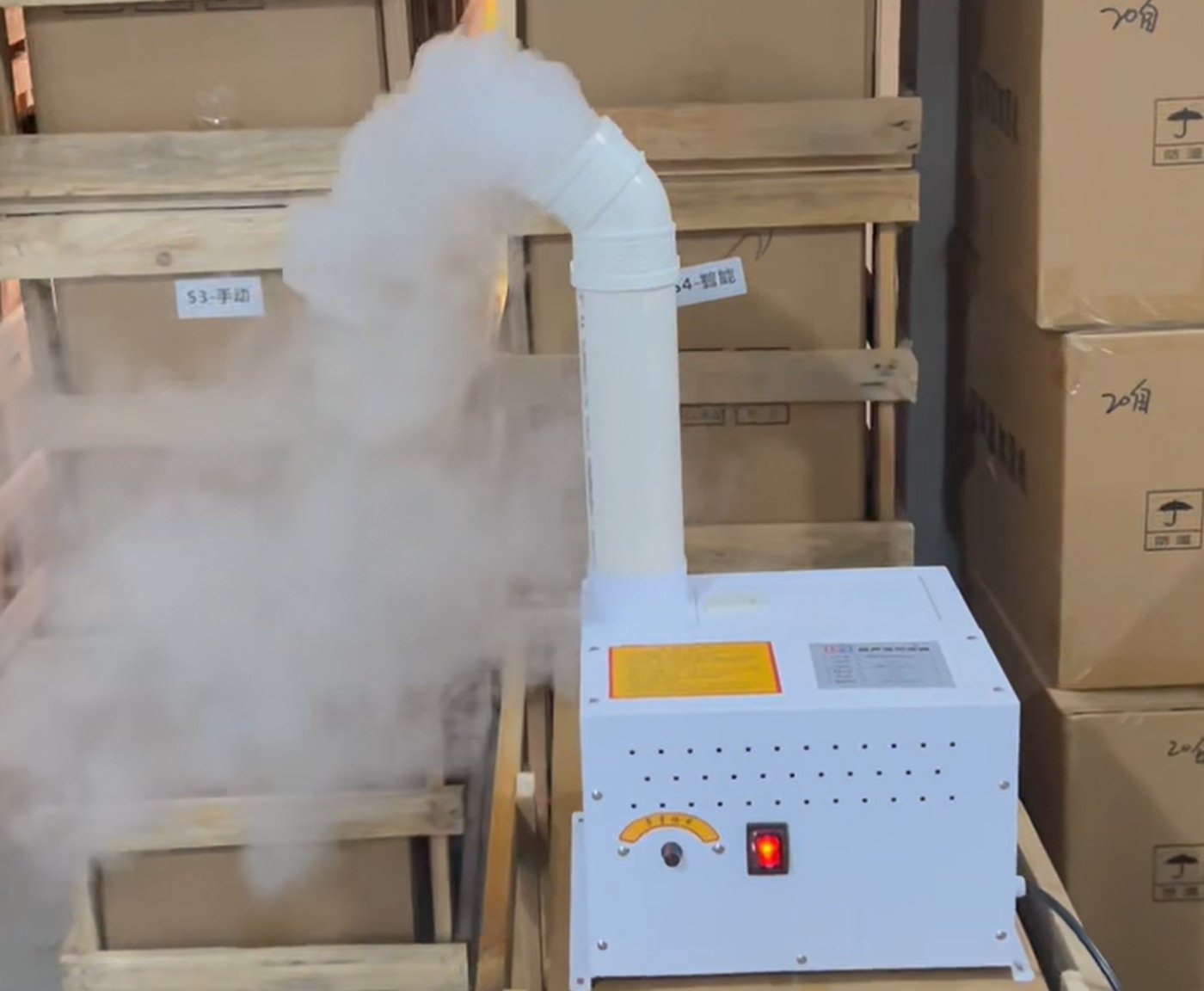 Industrial ultrasonic humidifier producing mist in warehouse application